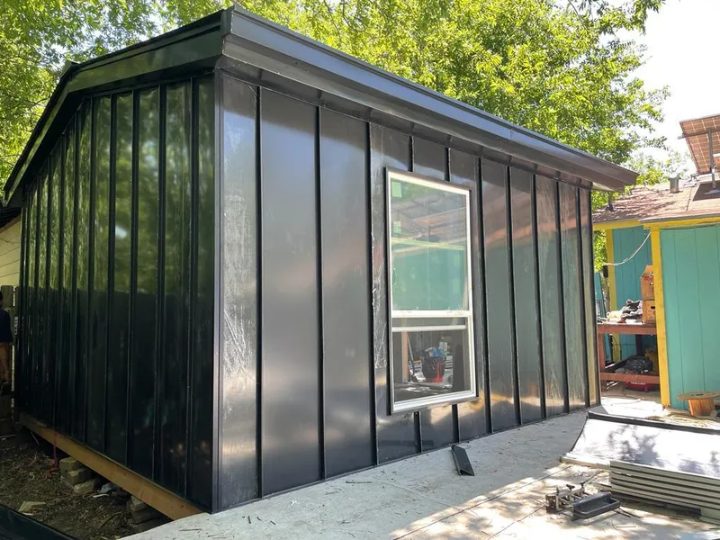 Black standing seam metal wall panels for Roof Inspection in Manhattan