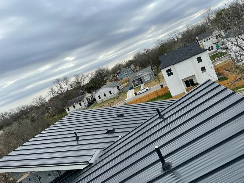 Standing seam metal roof panels with vents for Skylight Repair in Manhattan